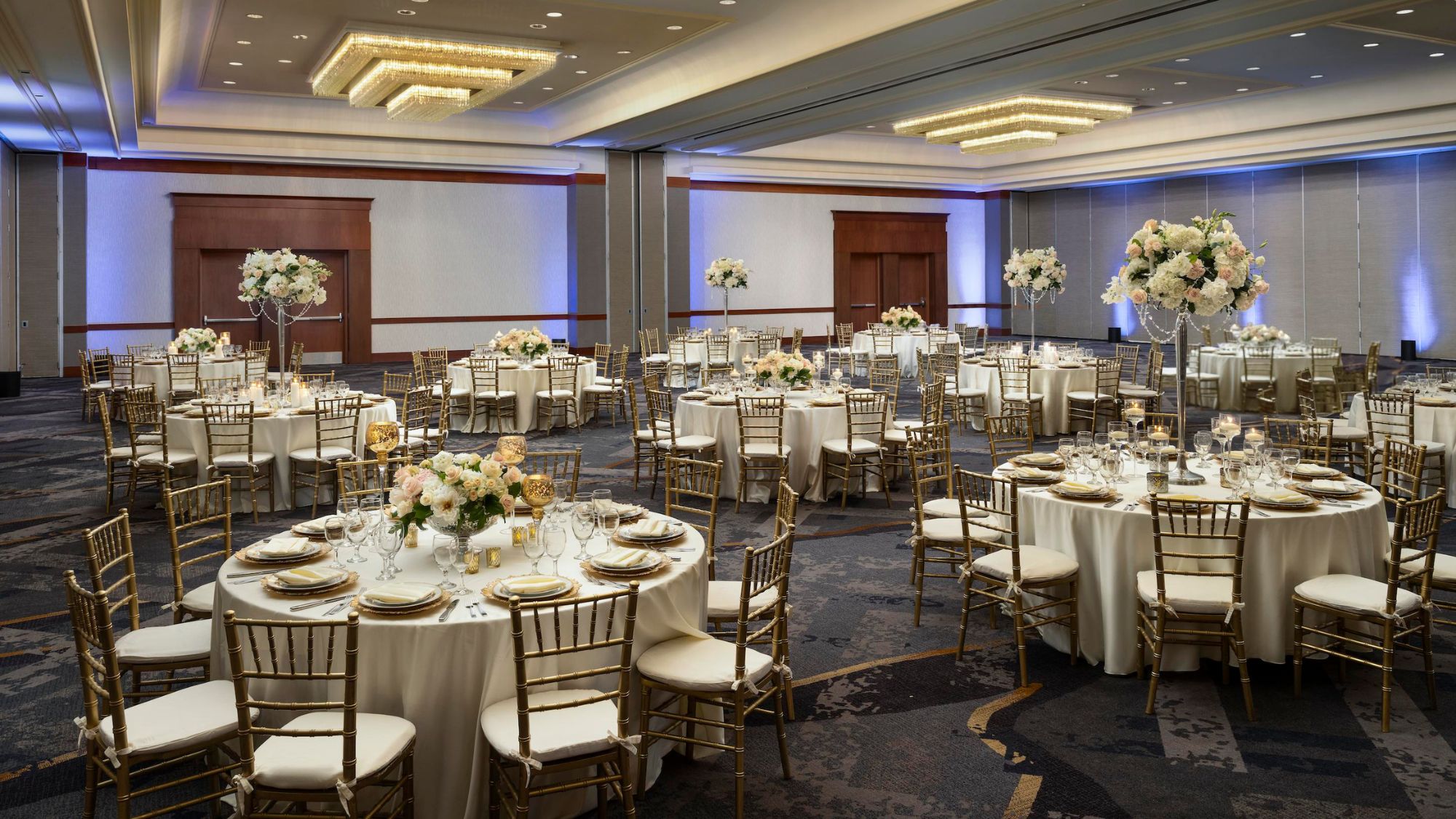 tables with flowers and chairs